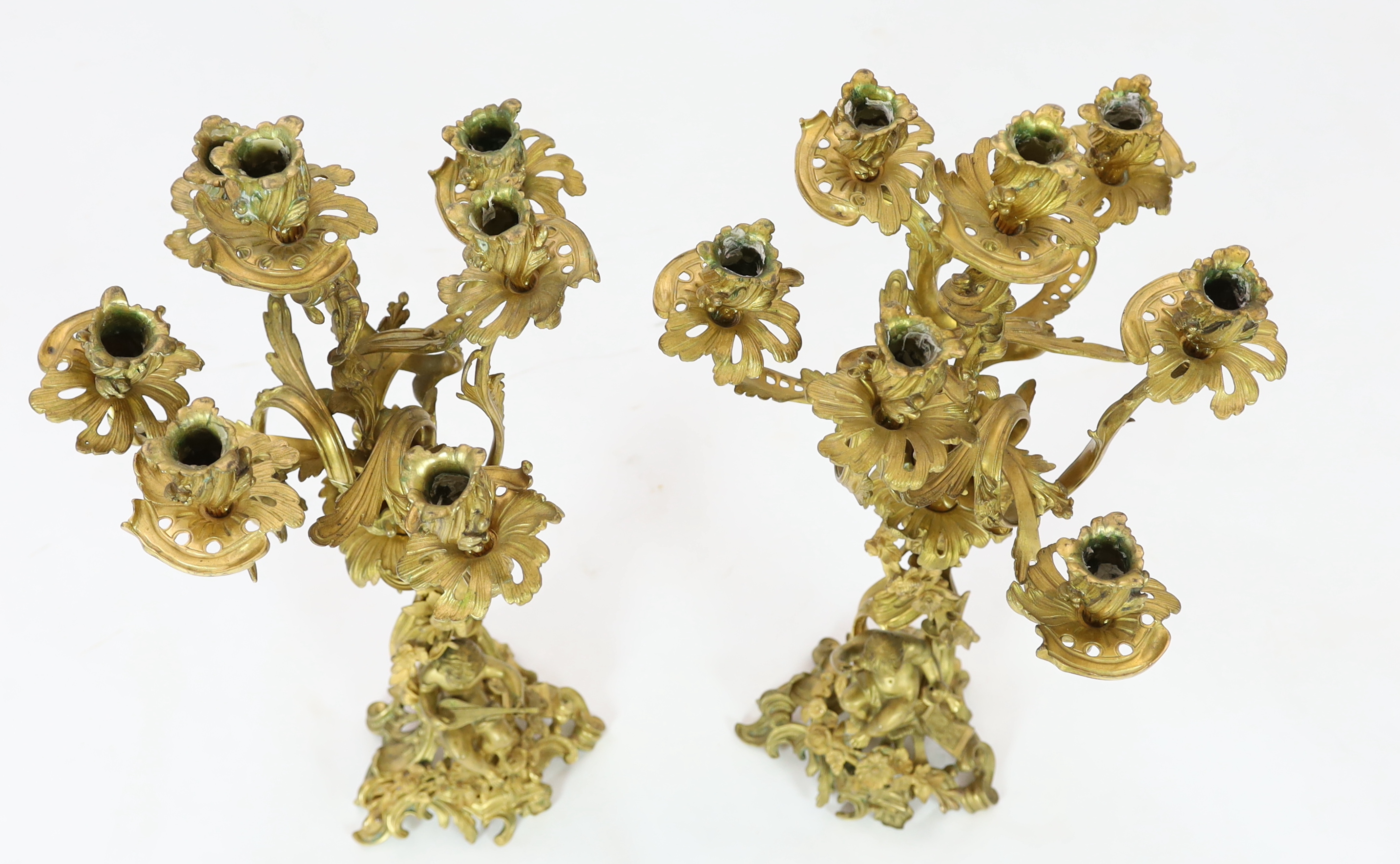 A pair of late 19th century French Louis XVI style ormolu seven light candelabra, 74cm high